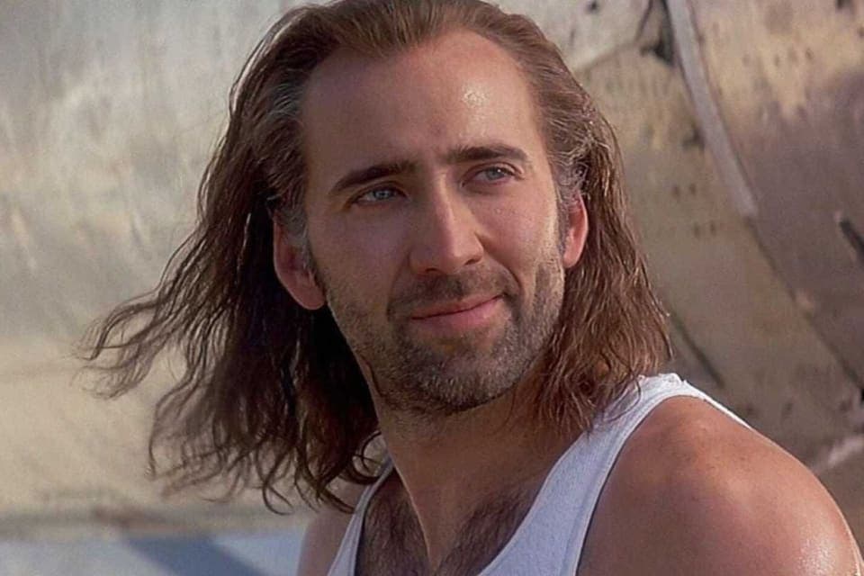 Nicolas Cage Spider-Noir inspired classic men’s haircut with side-swept styling